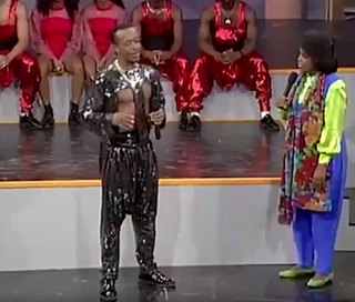 Illustration for article titled Enjoy This 1990 Clip of MC Hammer Trying to Teach Oprah Some Dance Moves